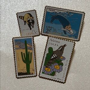 SET OF 4 VINTAGE “THE MARCH CO.” PINS